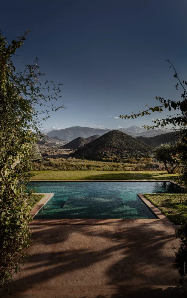 Infinity-edge pool opening onto the Ourika Valley