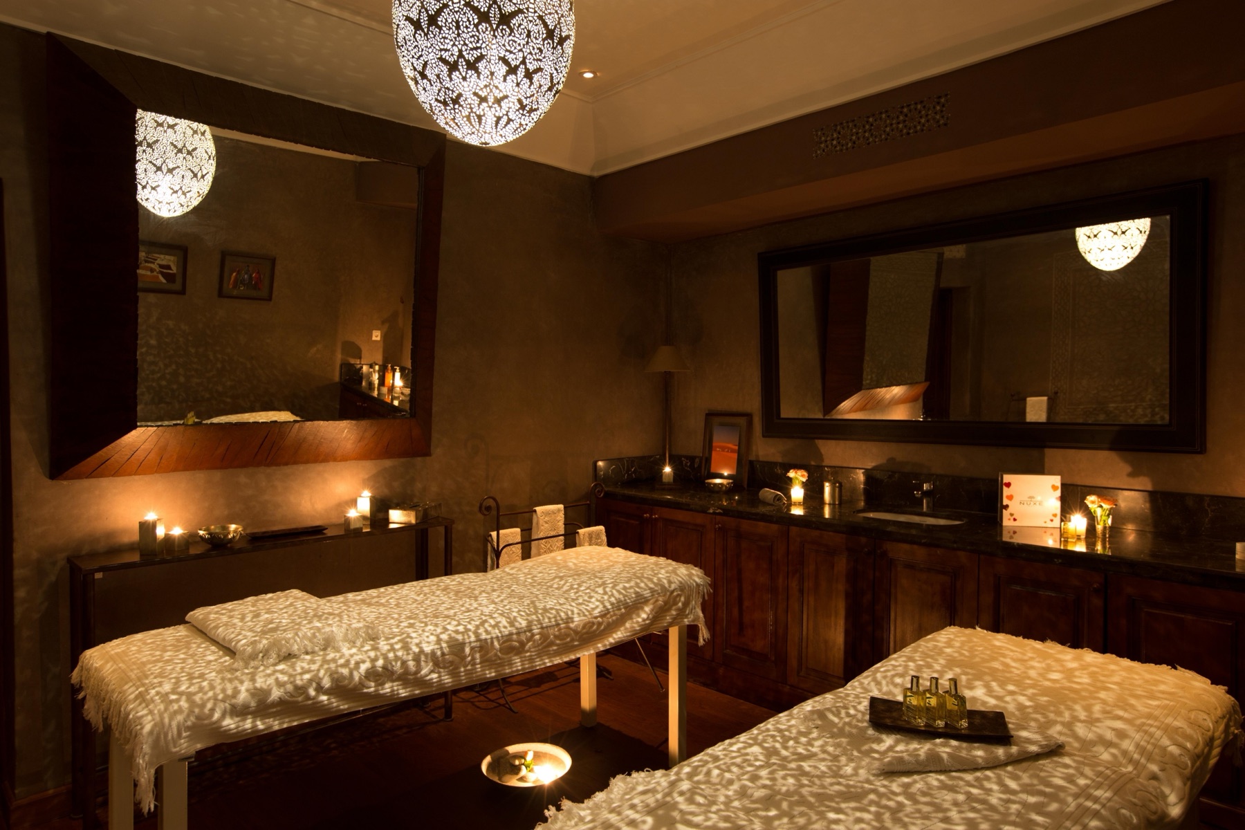 Treatment room with two massage tables in the hotel spa